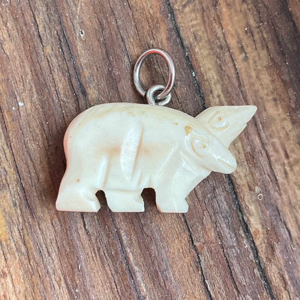 Carved polar bear pendant